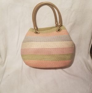 Small handbag with gold handles and gold strap